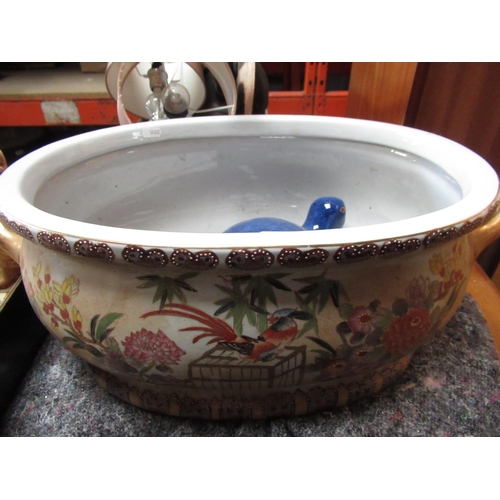 499 - Satsuma style footbath decorated with exotic birds and chrysanthemum, and an Art pottery doorstop in... 