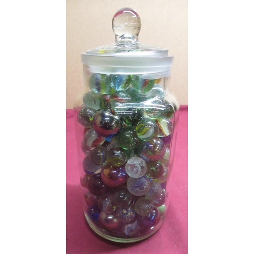 37 - Confectioners glass storage jar containing a selection of marbles of different designs and sizes