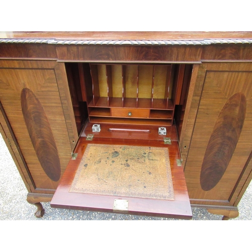 416 - Geo. III style break front mahogany side cabinet, with raised back and gadrooned top, above a fall f... 