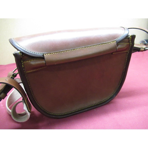 115 - Dark brown leather cartridge bag with suede lining and leather and canvas strap