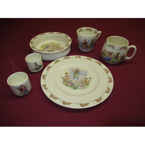 186 - Collection of Royal Daulton Bunnikins ware including: childs dish, plate, two mugs and two egg cups