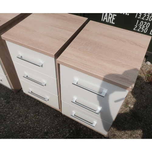 506 - Set of three limed oak finish and white three drawer bedside chests, W40cm D45cm H68cm, and a simila... 