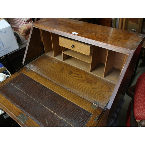 276 - 1930s oak bureau with fall front above two drawers on turned supports joined by stretchers, W72cm D4... 