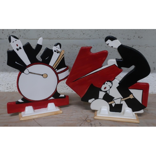 9 - Two Wedgwood Bizarre by Clarice Cliff 'Age of Jazz' models of musicians, Man with Drum and Man at Pi... 