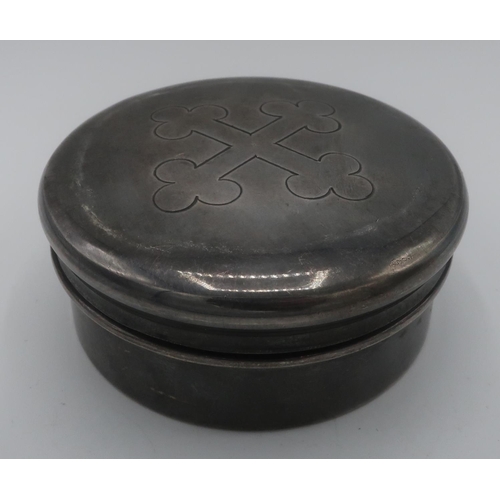 1097 - Geo.V1 hallmarked silver circular wafer box, cover engraved with a Bottony type cross and with gilt ... 