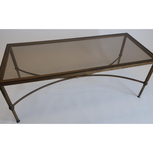 1283 - Mid Century Hollywood Regency style brass rectangular coffee table with inset smoked glass top on fl... 