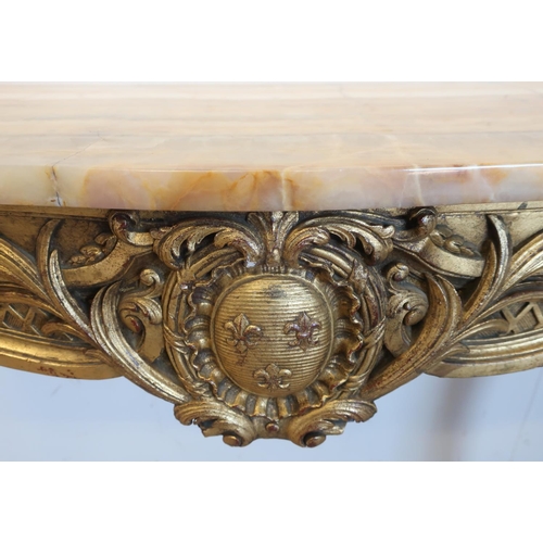 1279 - Edwardian Geo.II style giltwood console table, with serpentine variegated marble top on pierced S sc... 