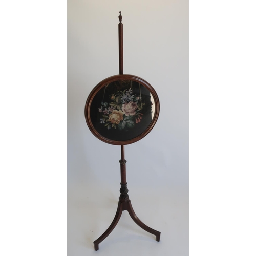 1286 - Regency mahogany tripod pole screen, circular banner worked with a wool study of roses, the acanthus... 