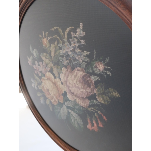 1286 - Regency mahogany tripod pole screen, circular banner worked with a wool study of roses, the acanthus... 