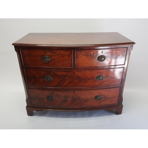 1292 - Victorian bow front mahogany chest of two short and two long drawers with brass laurel wreath handle... 