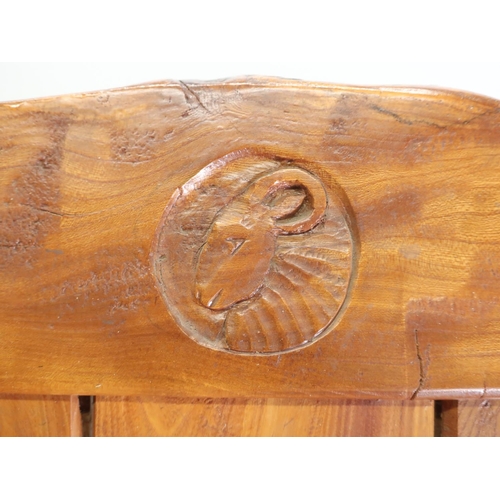 1051 - Yorkshire Oak  - a tavern type settle with shaped top rail, planked back and solid seat on solid sha... 