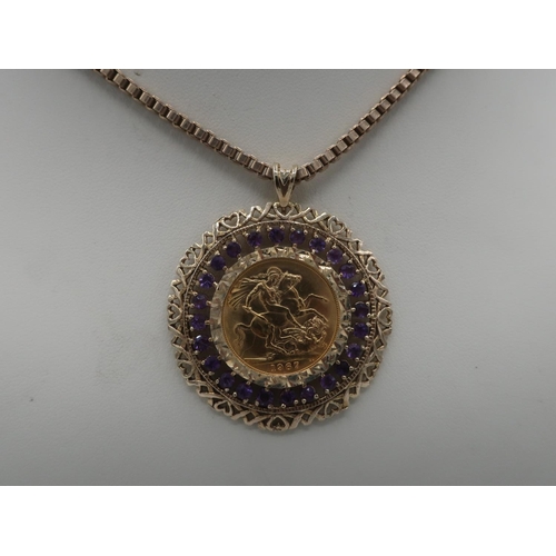 1142 - ER.ll Sovereign 1967, in 9ct hallmarked gold pierced and amethyst set loose mount, on 9ct box chain,... 