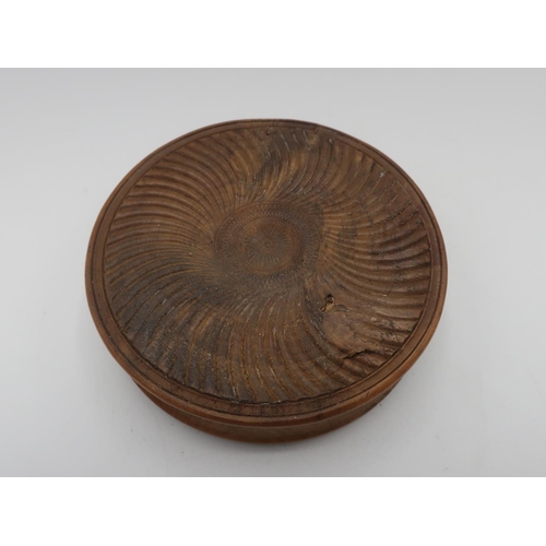 1152 - 19th C French burr maple circular snuff box, the lid pressed with a view of the Colonne De La Plac V... 