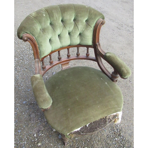 528 - Victorian walnut framed low open armchair with deep buttoned cresting and galleried back, on turned ... 