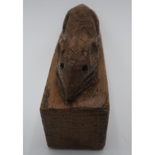 1025 - Robert Mouseman Thompson - an adzed oak door wedge, carved with signature mouse L18cm