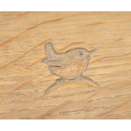 1041 - Bob Wren Man Hunter - a small oak book trough of angular form, incised with signature wren W30cm D17... 
