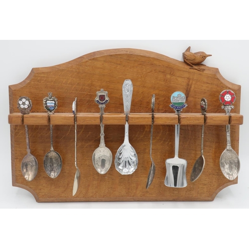 1042 - Bob Wren Man Hunter - an oak spoon rack, with arched top and single shelf, carved with signature wre... 