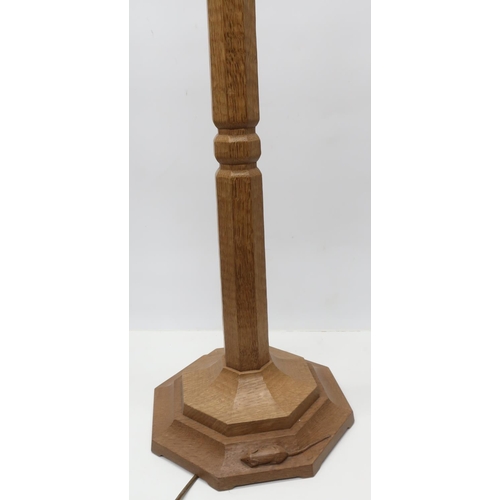 1005 - Robert Mouseman Thompson - an oak standard lamp, adzed octagonal tapering column on stepped base, ca... 