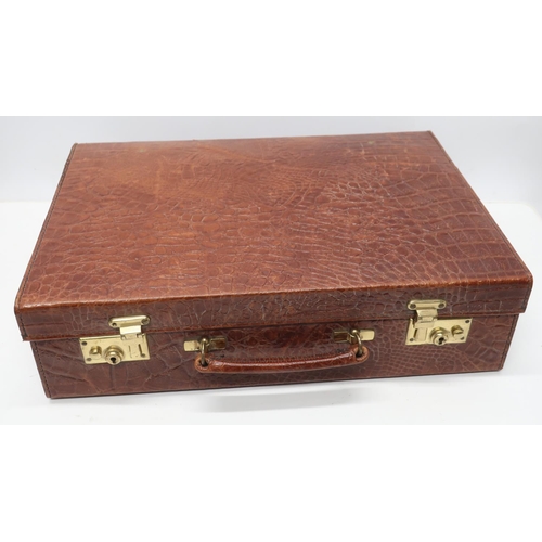 1154 - 20th C crocodile skin brief case with fitted interior, brass fittings, Hodges locks and applied Papw... 