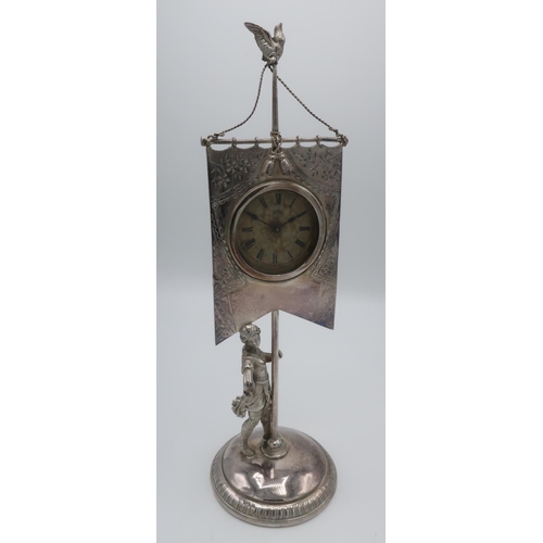 1266 - 20th C silver plate mantel time piece in the form of an Amazonian standard bearer, on circular domed... 