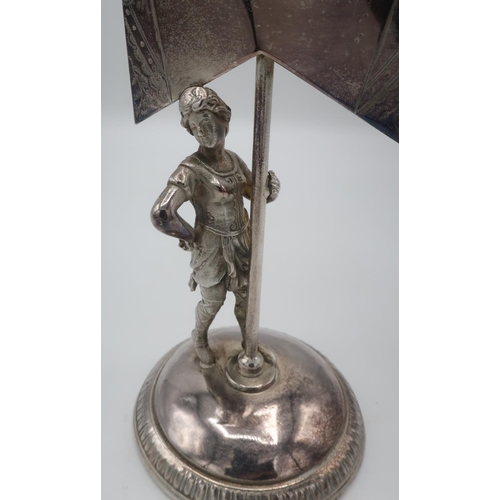 1266 - 20th C silver plate mantel time piece in the form of an Amazonian standard bearer, on circular domed... 