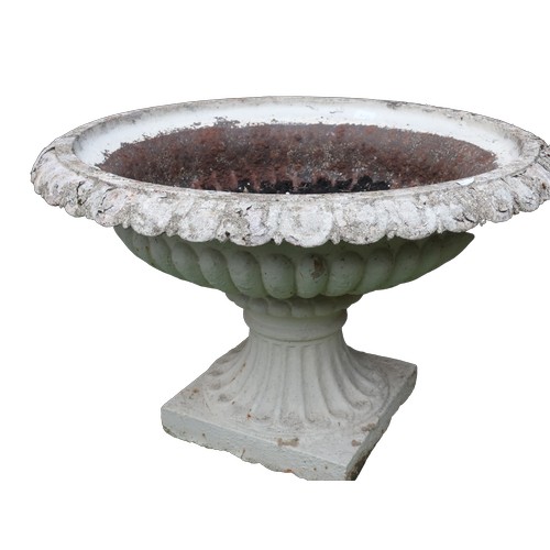 1352 - Pair of white painted cast iron lobed campana shaped garden urns, tapering supports on square bases ... 