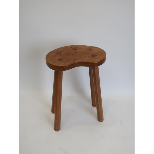 1066 - Andrew Conning Butterfly Furniture - an oak stool,  adzed kidney shaped top on four octagonal outspl... 