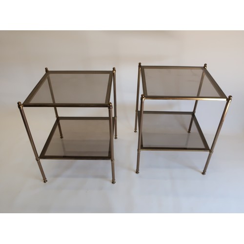 1284 - Pair of Mid century Hollywood Regency style brass side tables, with two inset smoked glass tiers on ... 