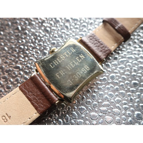 1122 - Longines mechanical wristwatch, rectangular wristed 10K gold filled case on leather strap. Snap on c... 
