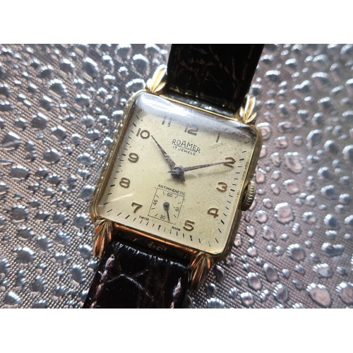 1130 - Roamer mechanical wristwatch, square rolled gold case on leather strap, snap on stainless steel back... 