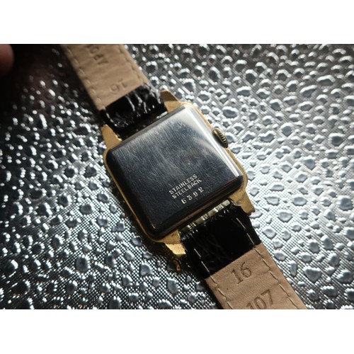 1130 - Roamer mechanical wristwatch, square rolled gold case on leather strap, snap on stainless steel back... 