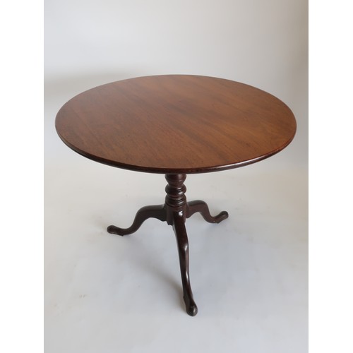1338 - Geo.III mahogany tea table, one piece tilt top on birdcage movement, baluster stem on three outsplay... 