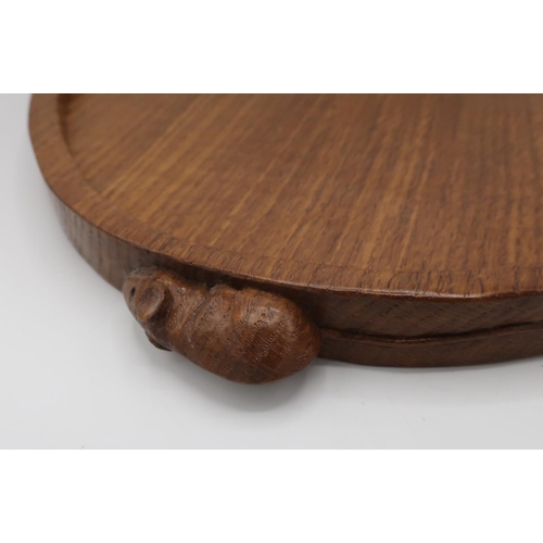 1021 - Robert Mouseman Thompson - kidney shaped adzed oak tea tray with raised border, carved with two sign... 