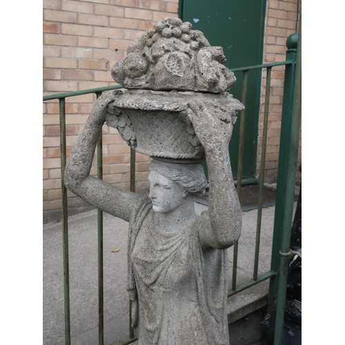 1351 - Composite garden figure modelled as a female flower seller, H132cm, another similar of a female carr... 