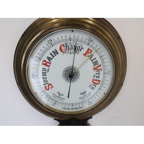 1261 - Large Victorian aneroid wheel barometer and thermometer, 25cm circular dial with brass bezel, 25cm t... 