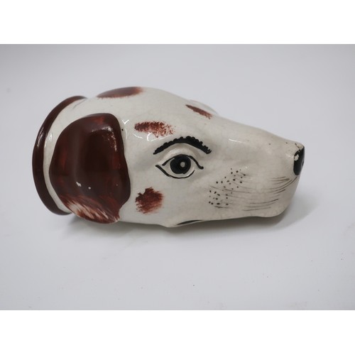 1244 - 19th Century Staffordshire hound head stirrup cup with brown sponged decoration, black eyes, whisker... 