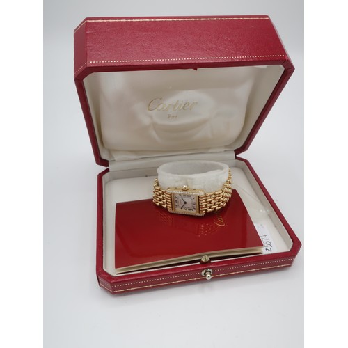 1115 - Ladies Cartier 18k gold Tank quartz wrist watch, textured Roman dial with diamond sides, case stampe... 