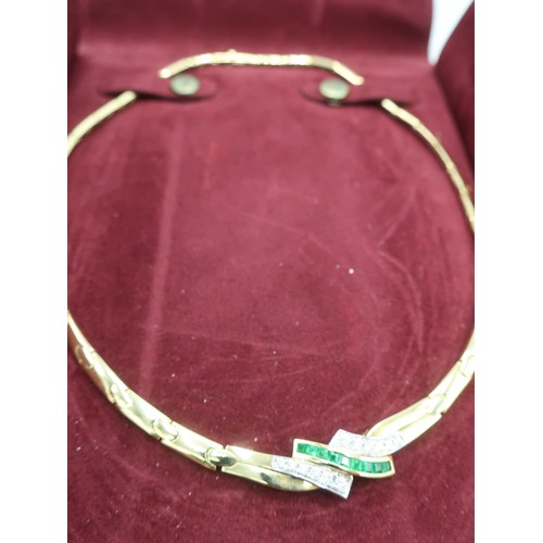 1138 - 18K gold Art Deco style articulated collar necklace, angular crossover set with emerald and diamond ... 