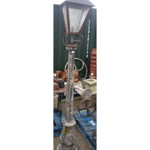 121 - Composite stone and metal streetlamp, H238cm