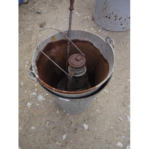 92 - Two galvanised steel bucket, hurricane lamp and fire poker