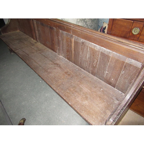 341 - Early 20th C oak church pew with triple panelled back and moulded top rail, on shaped end supports, ... 