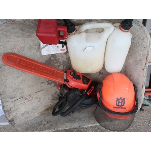 299 - Dolmar petrol chainsaw with Husqvarna felling helmet, and a Oregon combination petrol and chain oil ... 