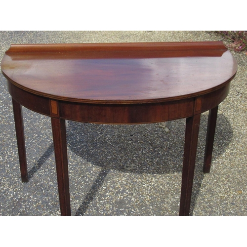 151 - George III mahogany D-shaped side table with raised back and single drawer on square tapered support... 
