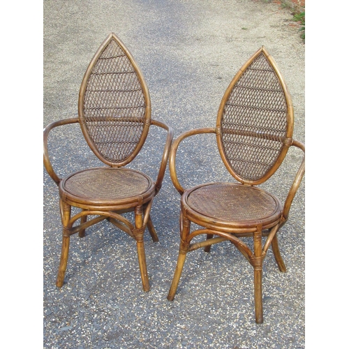 154 - Pair of bamboo conservatory chairs with leaf shaped backs and circular seats H.102cm (2)