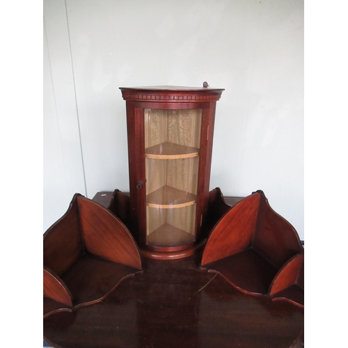 156 - Small mahogany bow-front corner cabinet W.33cm H.60cm D.24cm, and a pair of Glenister corner three-t... 