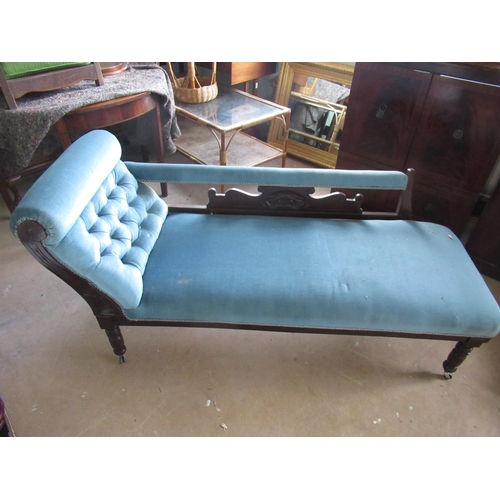 162 - Victorian chaise longue, pierced back with upholstered top rail, on turned supports  L.170cm D.65cm ... 