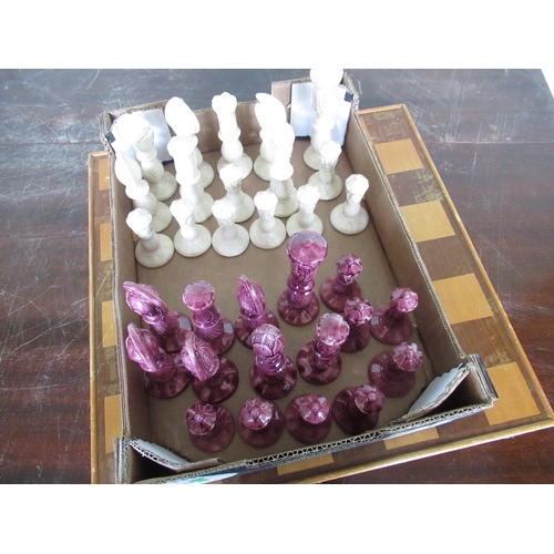 121 - Glazed earthenware chess set complete with board