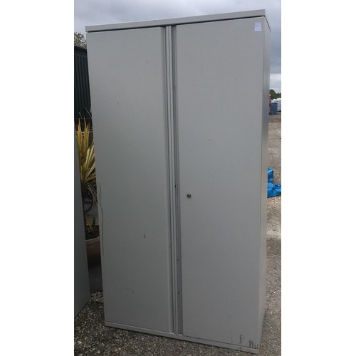 352 - Two door metal cabinet with shelves