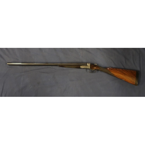 18 - Unnamed 12 bore side by side shotgun with 28 inch barrels and 15 1/4 inch straight through stock, se... 