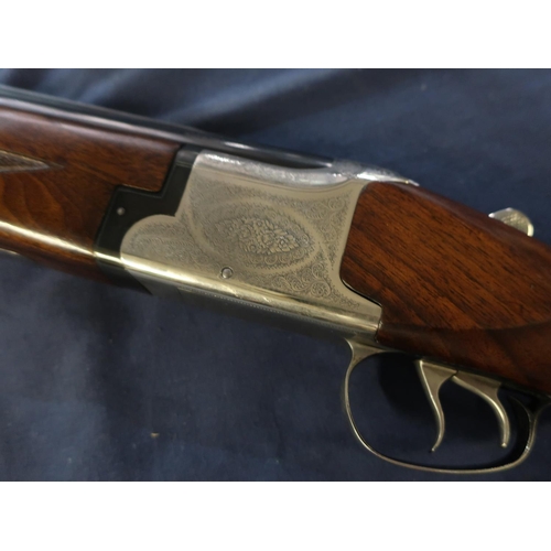 23 - Larona 12 bore over and under ejector shotgun with 28inch adjustable choke barrel and 14 3/4 inch pi... 